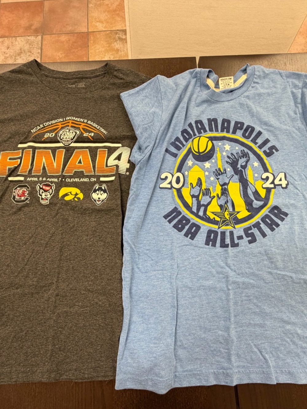 Two small 2024 basketball tee shirts